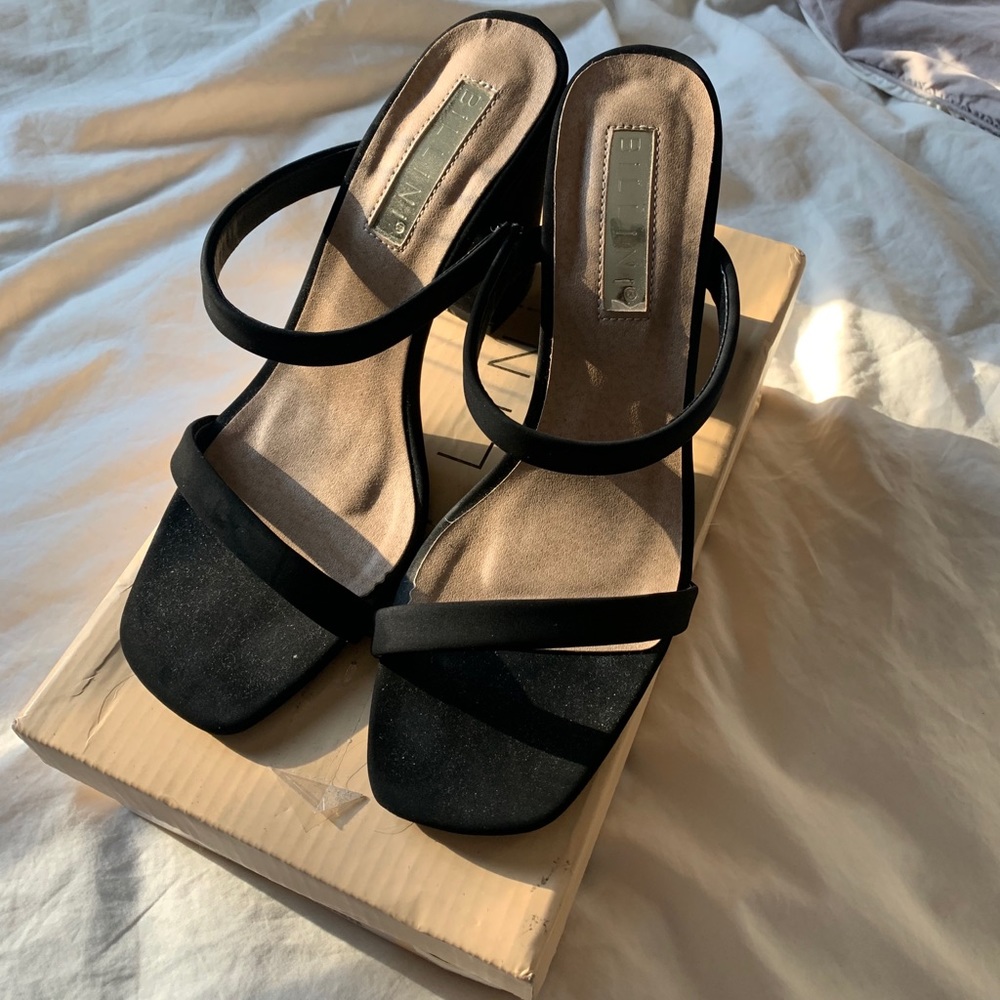 Black strappy mules